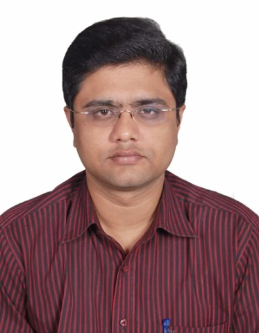 Dr Raja R